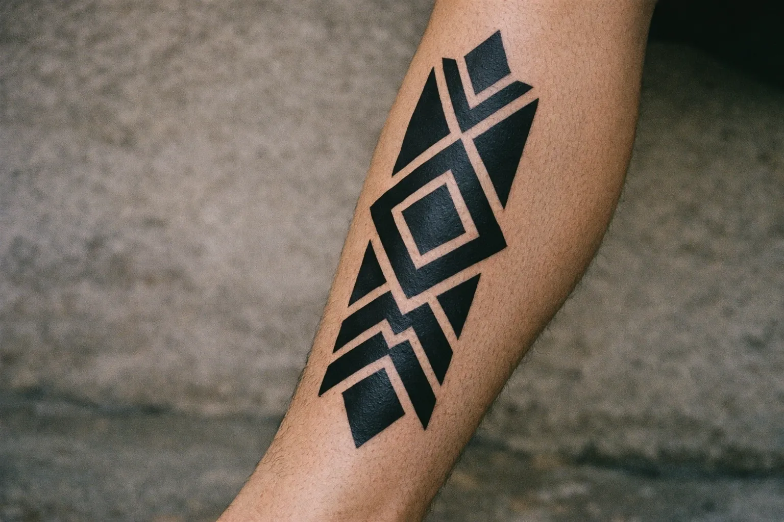 Blackwork tattoo on the shin