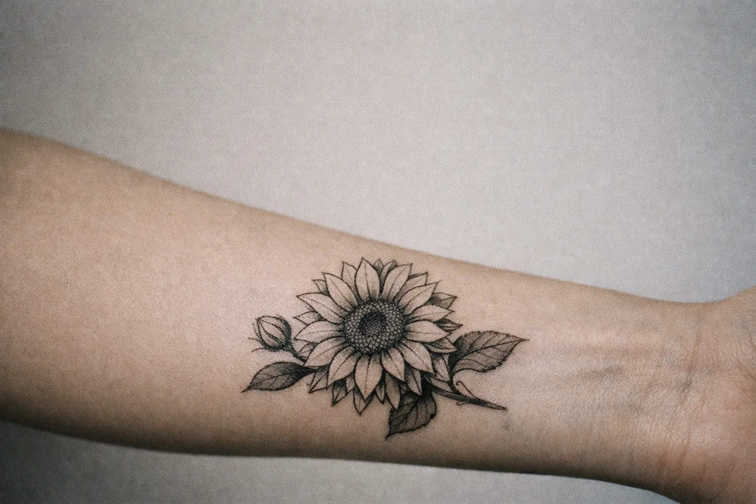 Forearm tattoo aligned with the 1/3 rule showing composition guidelines.
